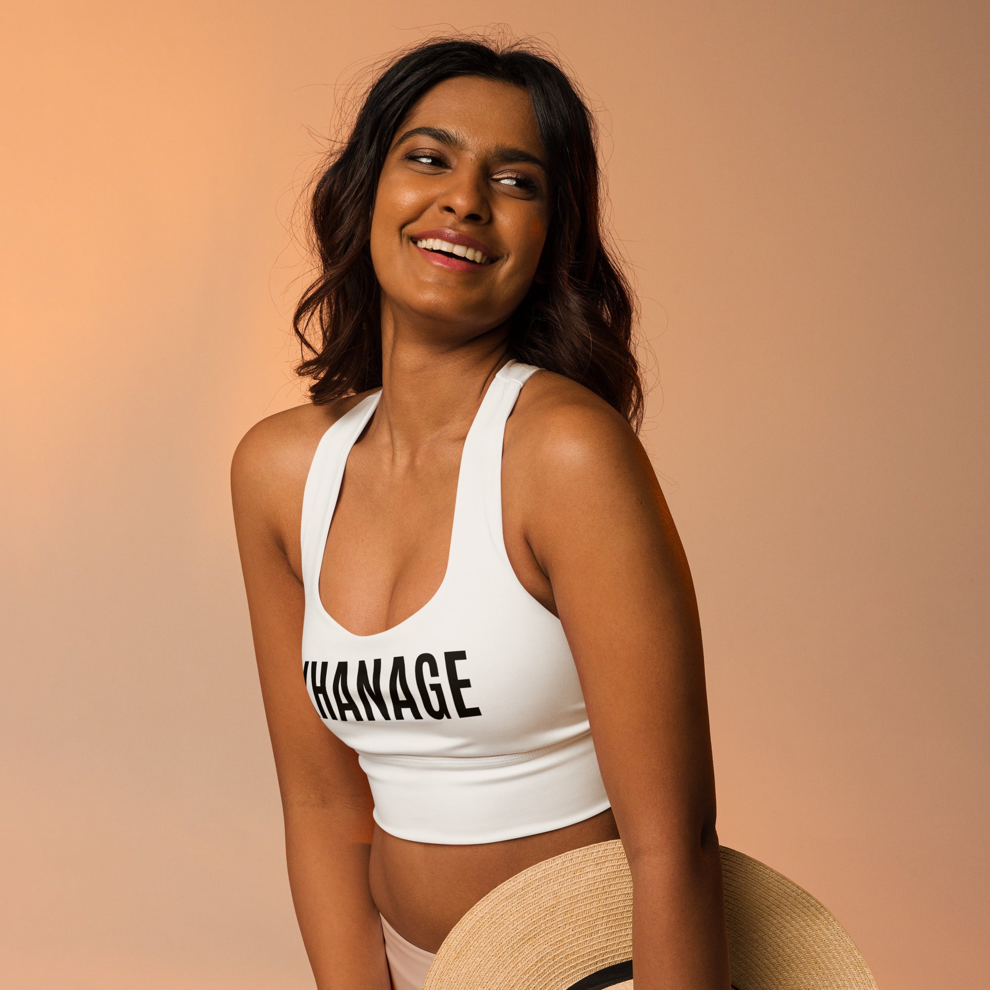Close-up of KHANAGE branding on recycled longline sports bra — New Zealand activewear