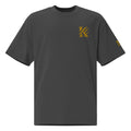 Front view of KHANAGE Collective oversized faded tee in black and gold — streetwear NZ
