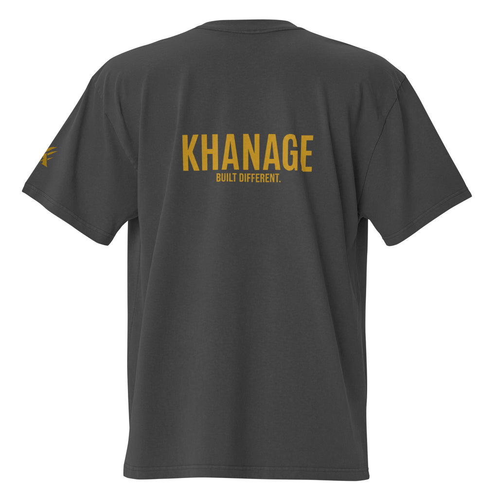 Rear view of KHANAGE Collective oversized faded tee in black and gold
