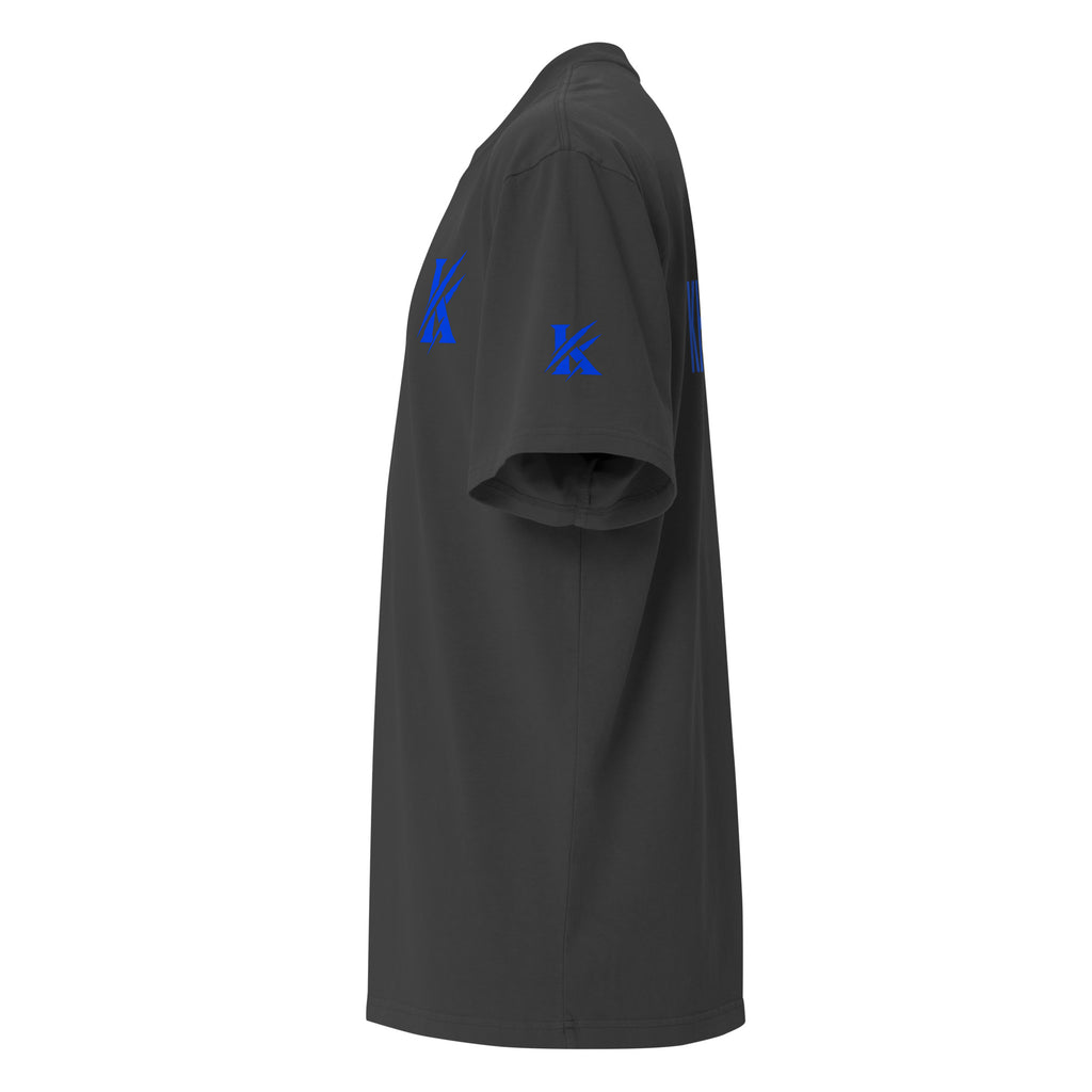 Left view of KHANAGE Collective oversized faded tee in black with cobalt blue graphic