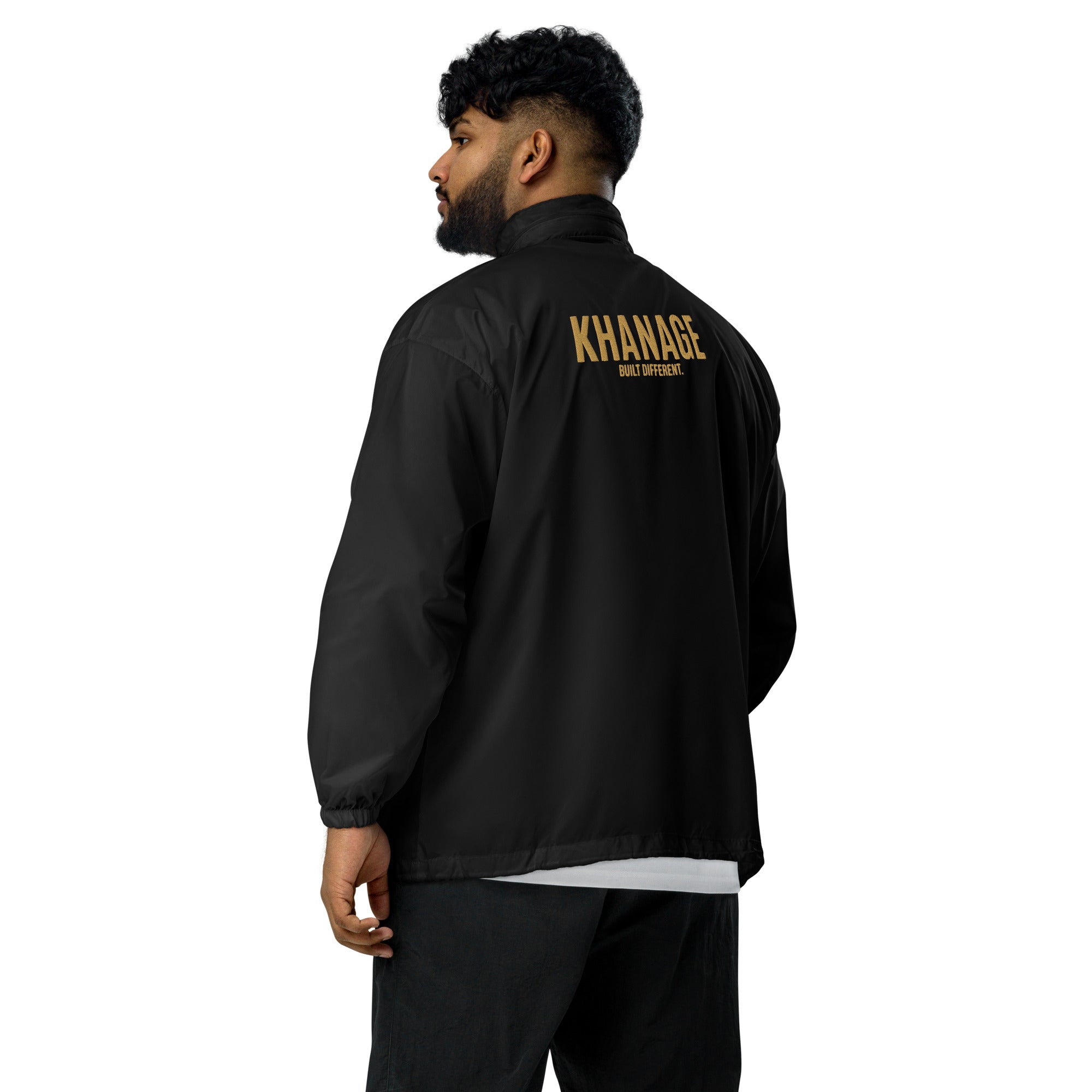 Rear view of KHANAGE Collective classic logo windbreaker — lightweight premium jacket