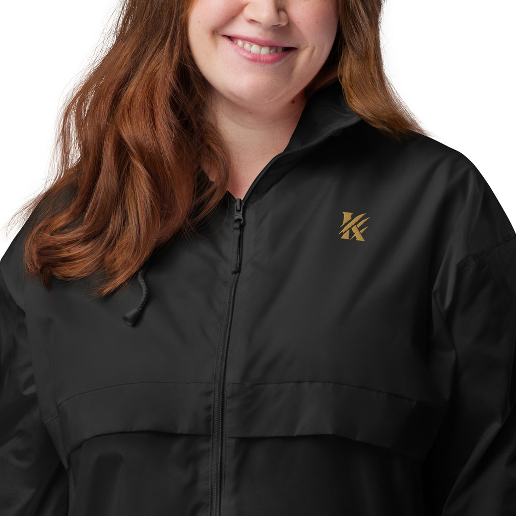 Close-up of classic KHANAGE logo on unisex windbreaker