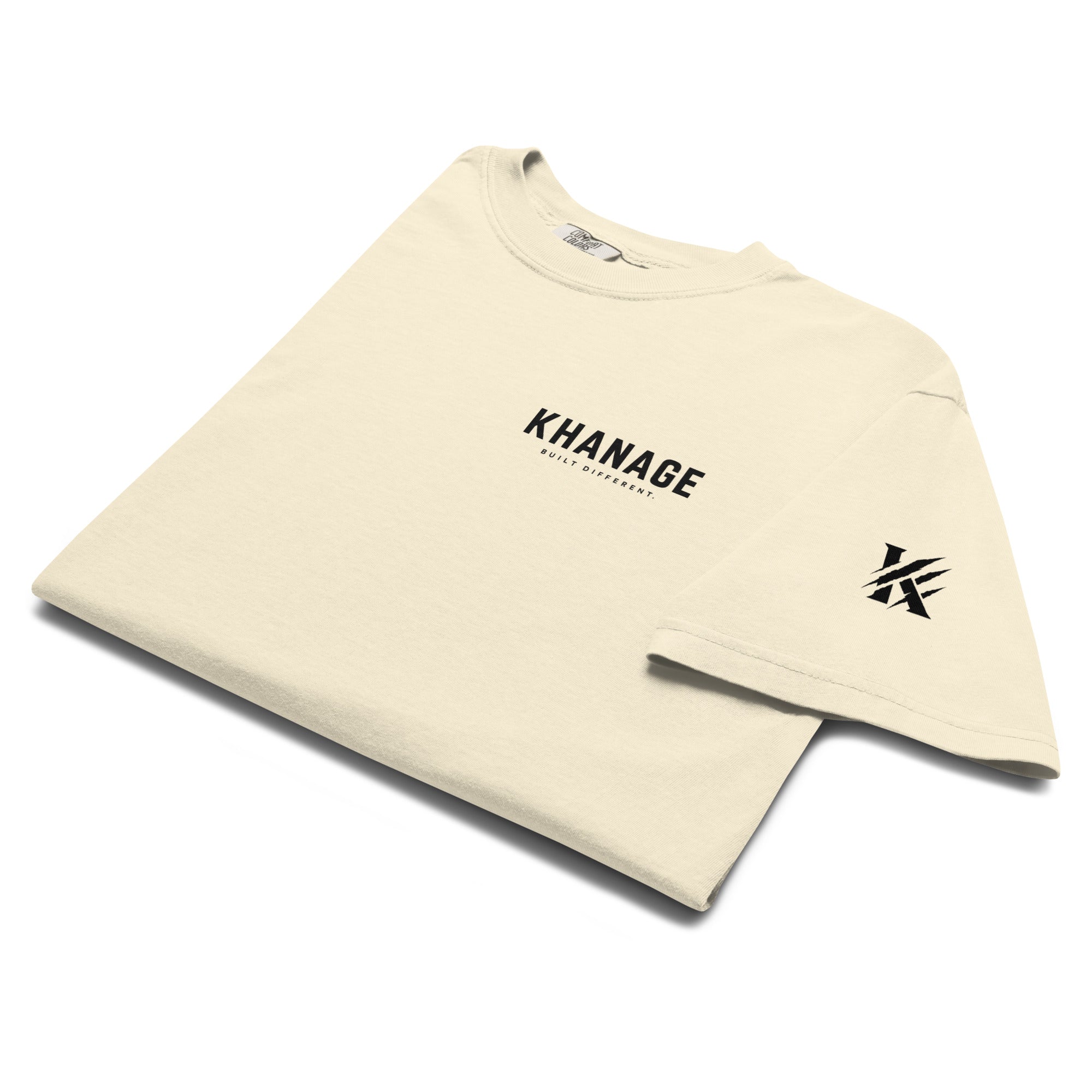 Close-up of Built Different graphic on KHANAGE heavyweight t-shirt