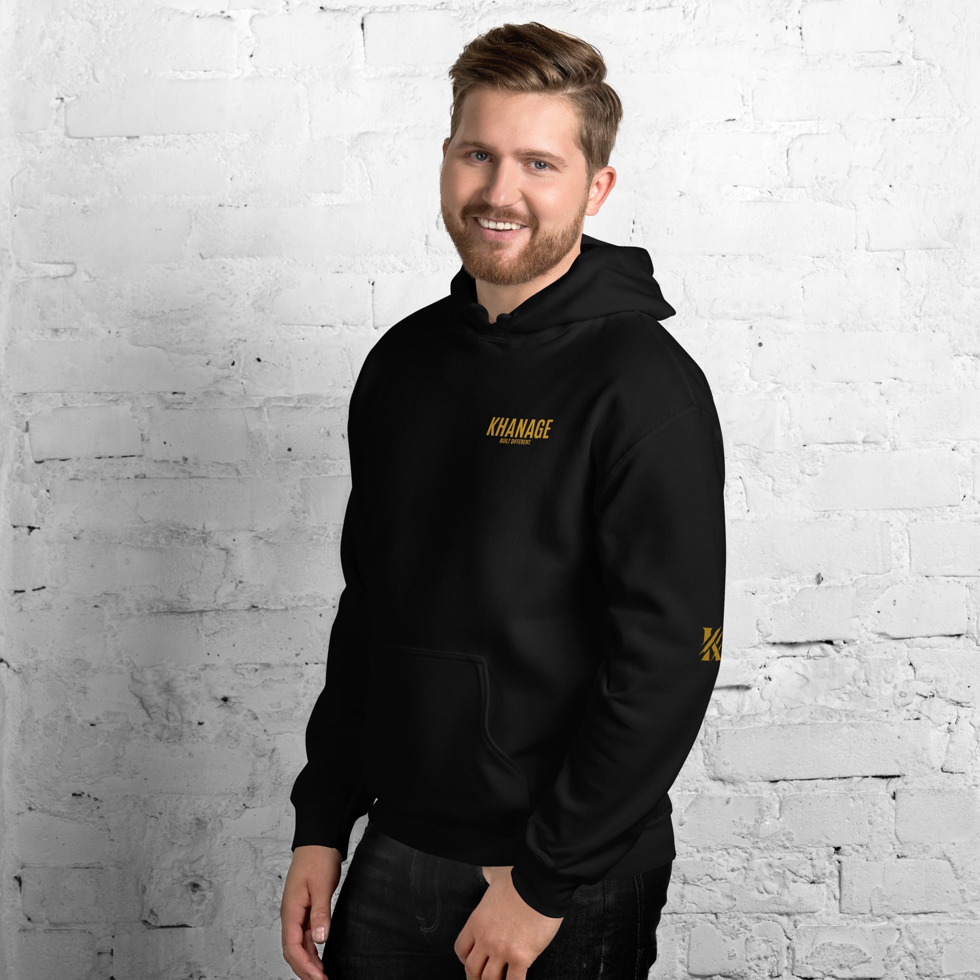 Close-up of Built Different embroidery on KHANAGE premium hoodie